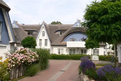 Image de Bien-être et détente dans la maison au toit de roseaux – Appartement 'Wellness-Residenz'