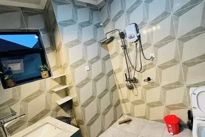 Cozy Nest\nChic 1-bedroom apartment in superb Kigali with fitness room, WiFi.