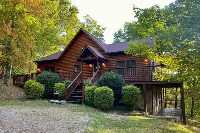 Spacious and peaceful Providence with 2 master suites and large wrap-around deck