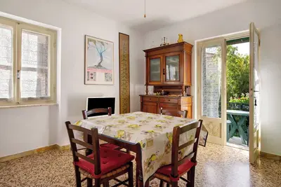 Image de Appartement 'Collodi 22, Garden Wifi' avec jardin partagé, balcon et Wi-Fi