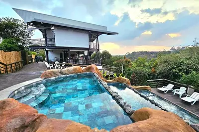 Image de Charming 1-bedroom chalet in lush Poas with cascading pools & raw nature WiFi