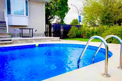 Image de Maison Zen avec Piscine Privée, Piano & Jardin – Détente garantie!