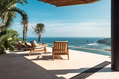 Image de Villa Awasi - 3 Bedroom - 1 Tv room with sofa bed at Tampah Hills