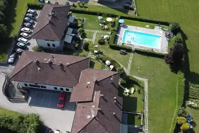 Image de Appartement 'Di Pastei 13' avec vue sur le lac, piscine partagée et Wi-Fi