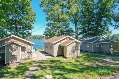 Two Bedroom - Lakeview Cabins - These lovely two-bedroom cabins create the ideal lake life vacation setting! Overlooking Lake Shafer and 1/4 mile away from Indiana Beach Amusement Park. 500 sq ft features two (2) full beds and one (1) futon - sleeps