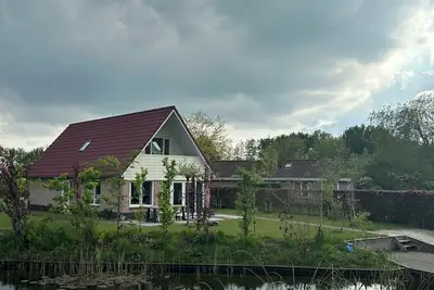 Image de Brand new built spacious home, Direct to a lovely natural swimming pond