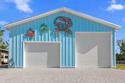 Image de The Twisted Fiddler -brand new home- sleeps 14 with optional boat slips