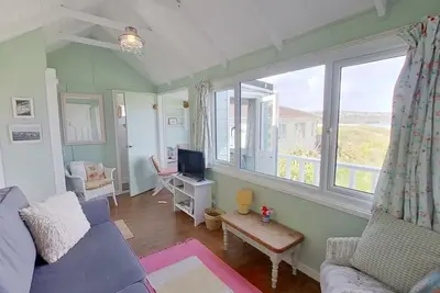 Image de Sandford is a charming, traditional beach chalet, with great sea views.