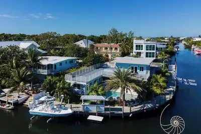Image de Blue Palm Oasis ~ 4 Bedroom Plantation Key Home w/ Pool & 170` of Dockage