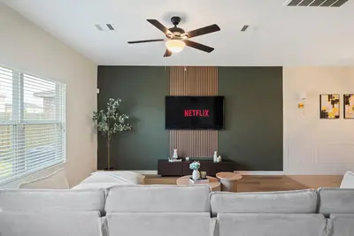 Image de Chic and Cozy 5 bedroom house w 10 minutes to Iah