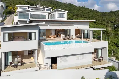 Image de spacious and stylish 4-bedroom private pool villa nestled in the scenic hills of Chaweng Noi.