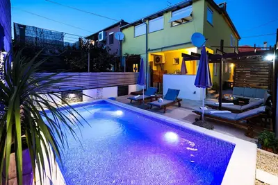Image de Apartment de deux chambres avec piscine extérieure