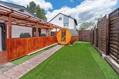 Image de Maison de vacances 'Zum Stumpfen Turm' avec sauna, terrasse privée et jardin privatif