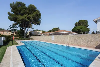 Maison de vacances 'Luny Playa Gandia' avec piscine partagée, Wi-Fi et climatisation