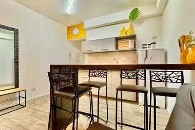 Image de Studio Amarelo, com ar e garagem ao lado shopping.