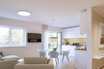 Image de KÜSTE33- Achtern Diek 33/38 - close to the beach with sauna & balcony directly on the coast!
