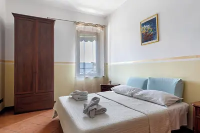 Image de Chambre 'Family Locanda 7 Camini' avec Wi-Fi et climatisation