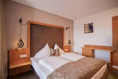 Image de Appartement 'Lavendel' avec vue sur les montagnes, piscine partagée et Wi-Fi