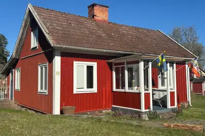 Image de Hus Bockare in Småland – red Swedish cottage with fireplace & garden for 5