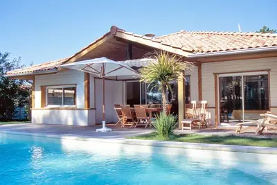 Image de Terrasse, cheminée ou poêle à bois, parking, télévision, 110m², Moliets-et-Maa