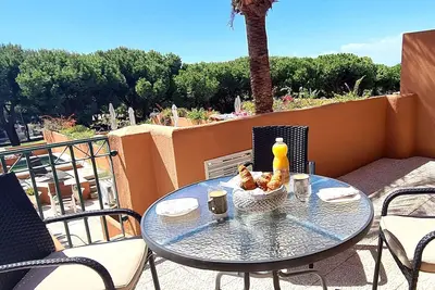 Image de Appartement 'Lejlighed I Cabopino' avec piscine partagée, Wi-Fi et climatisation