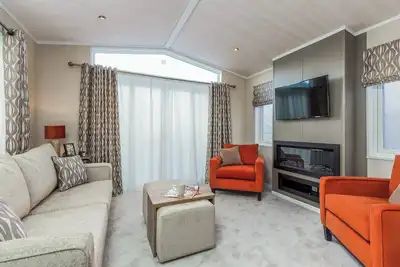 Image de Luxurious Lodge, perfect for couples or familes, sleeping four people.