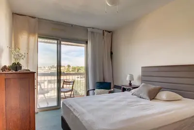 Image de Appartement au centre avec piscine et parking privé à 1 mn de la plage