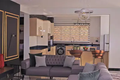 Image de Charming 2-bedroom apartment with Ac, fully equipped kitchen in vibrant Kampala