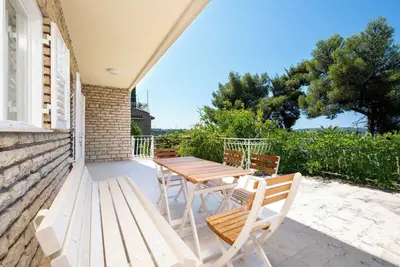 Image de Spacious bechfront apartment with balcony and fireplace
