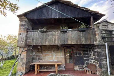 Image de Lo Macario Pasiega cabin, with forest views