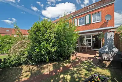 Image de Appartement \"Schönes Maritimes Haus\" avec terrasse privée, jardin privé et Wi-Fi