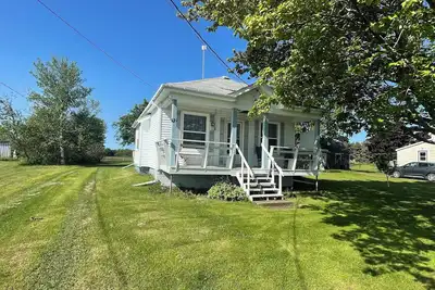 Image de Cute Nb cottage! \nWalking distance to sand beaches with distant view of the ocean