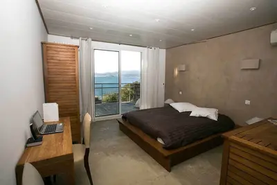 Image de Villa pieds dans l'eau, accès direct à une plage de sable. Vue mer imprenable;