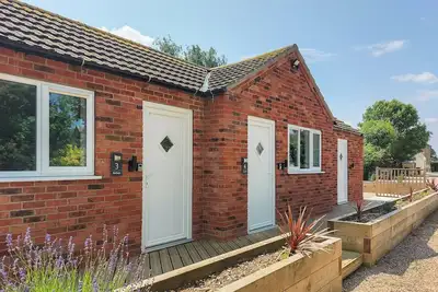 Image de 1 chambres à coucher à Walcott
