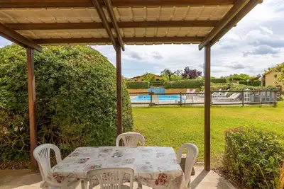 Image de Appartement 'Milla - Bilocale Tordo' avec piscine partagée, terrasse privée et Wi-Fi