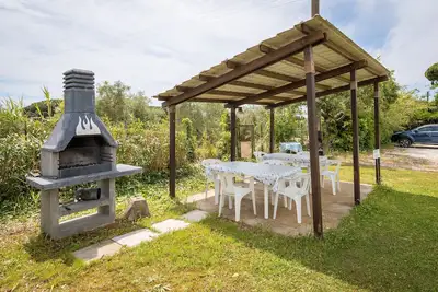 Image de Appartement 'Casa Milla - Bilocale Becaccia' avec piscine partagée, terrasse partagée et Wi-Fi