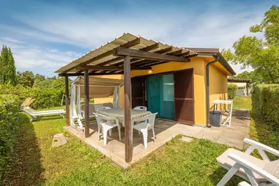 Image de Maison de vacances 'Milla - Villetta Pernice' avec piscine partagée, terrasse privée et Wi-Fi