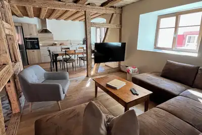 Image de Côté Brand : La Maison\nEn plein coeur d'un joli village pittoresque d'Alsace.