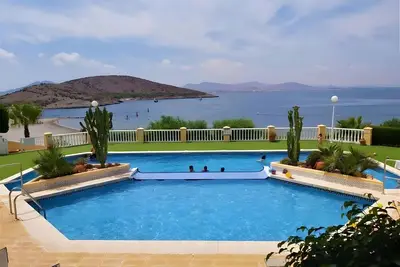 Image de Villa 'Urbanización Villas Romanas' avec vue sur la mer, piscine partagée et climatisation
