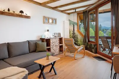 Image de Appartement \"Am Bärenhof\" avec vue sur les montagnes, balcon et Wi-Fi