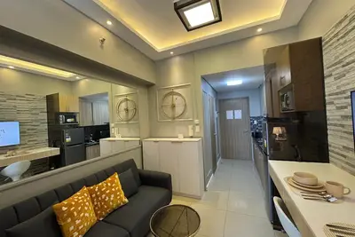 Image de Cozy 1-Br condo with Ac and WiFi in enchanting Pasay. Near Airport and Moa.