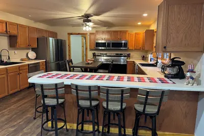 Image de Spacious Private 9 bedroom lodge Ac, hot tub, fire pit, fire place, 212 acres