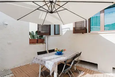 Image de Maison de vacances 'La Vanedda' avec terrasse privée, Wi-Fi et climatisation