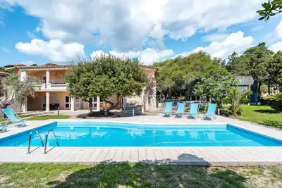 Image de Appartement 'La Vela Arancione' avec piscine partagée, Wi-Fi et climatisation