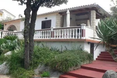 Image de Appartement de deux chambres avec la terrasse et la vue sur le mer Barbat, Rab (A-24215-a)