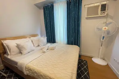 Image de Cozy 1-bedroom condo with fitness room and Ac in beautiful Manila
