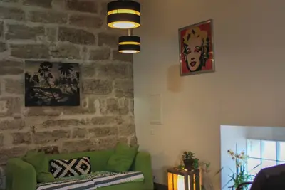 Image de Le Loft Molière - baignoire balnéo - 50m²