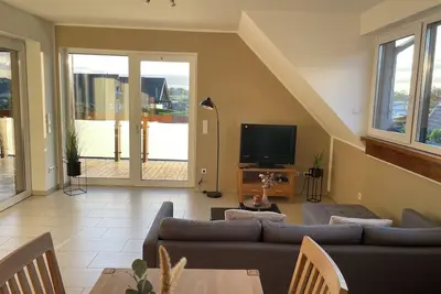 Image de Vacation apartment directly on the lake