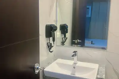 Image de 1br Executive Suite Gentry Manor near Okada Manila by Jms