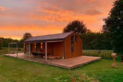 Image de This beautiful bungalow has all the space you need for a wonderful vacation. With a 500m² garden and modern furnishings, your vacation can begin!